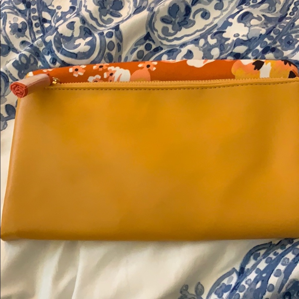 Hand held clutch purse
